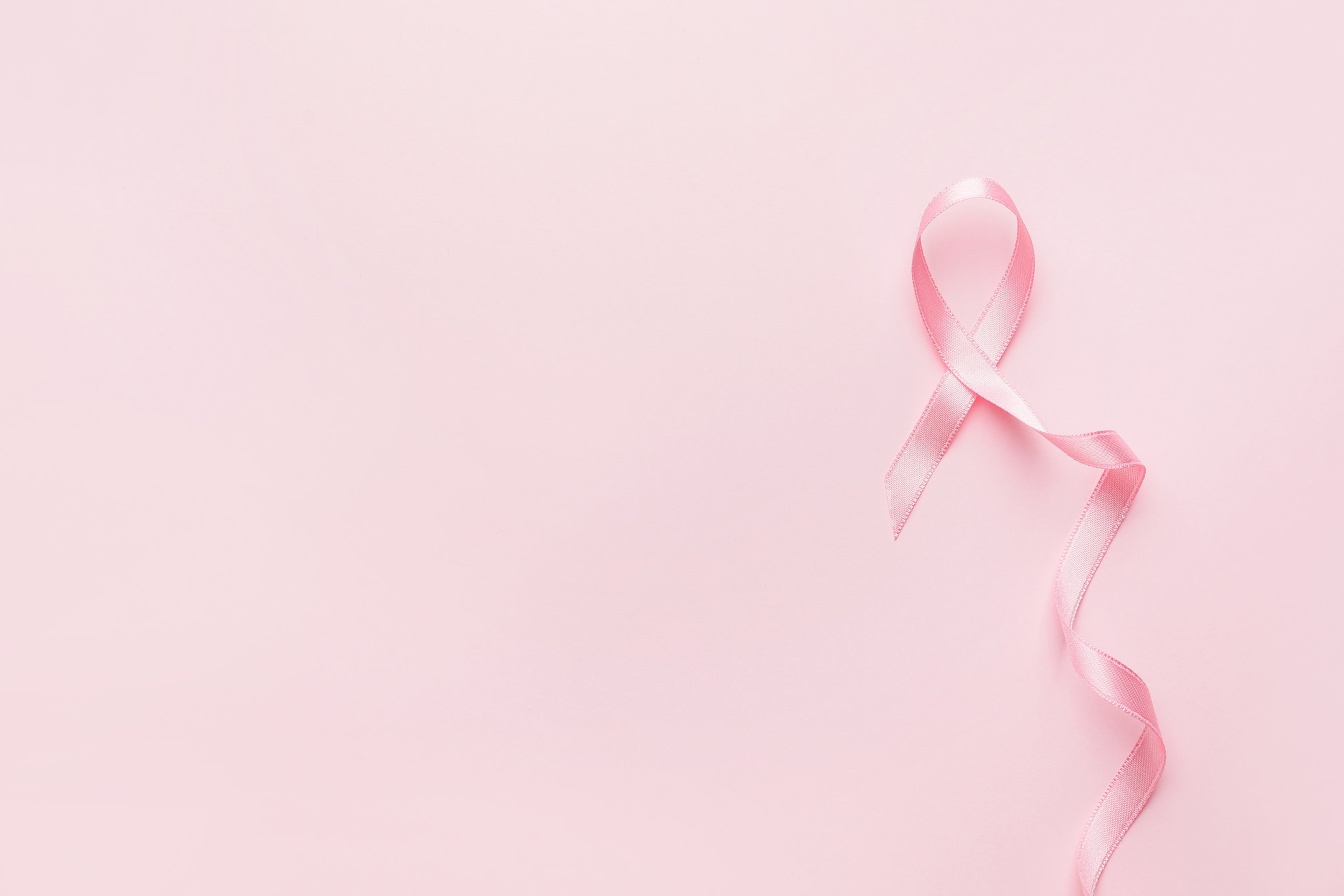 Pink Ribbon on Color Background. Breast Cancer Awareness Concept